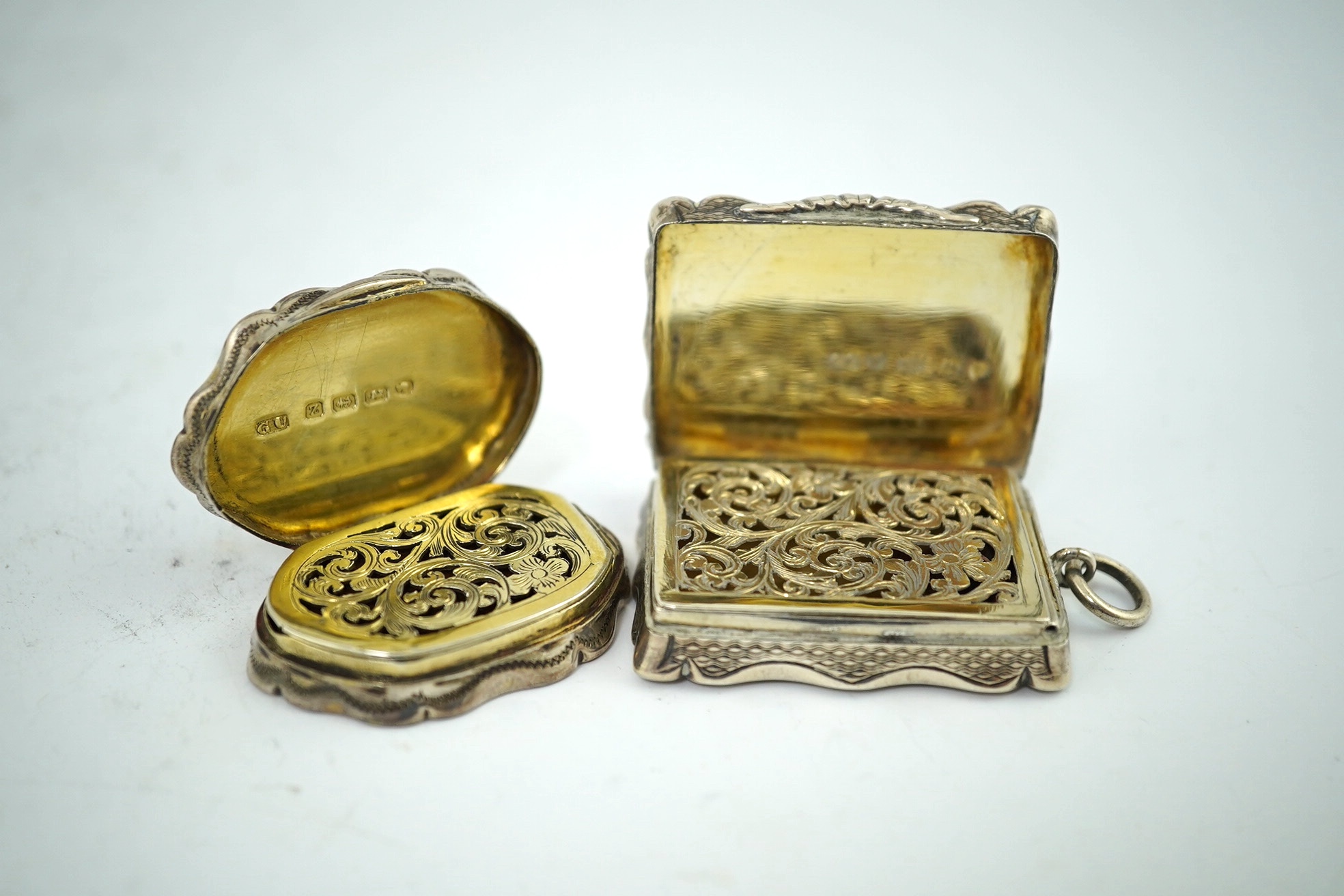 Two Victorian silver vinaigrettes, rectangular, mm. CC, Birmingham 1871, 4.2cm and lozenge shaped, by George Unite, Birmingham 1848, 4cm. Condition - fair to good